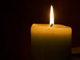 Candle flame white candle burning with darkness surrounding public domain image